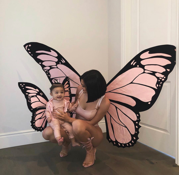Kylie Jenner and daughter Stormi Webster dressed as matching butterflies for Halloween in 2018.