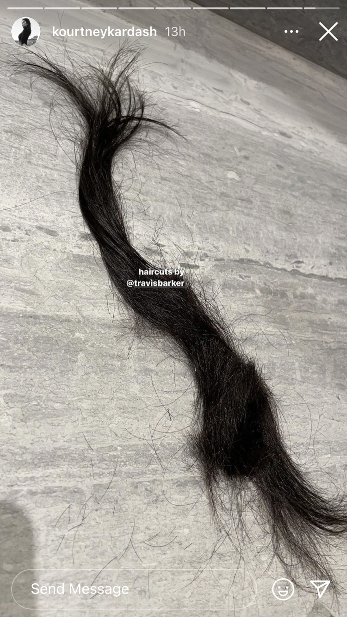 Travis Barker is cutting Kourtney Kardashian's hair!